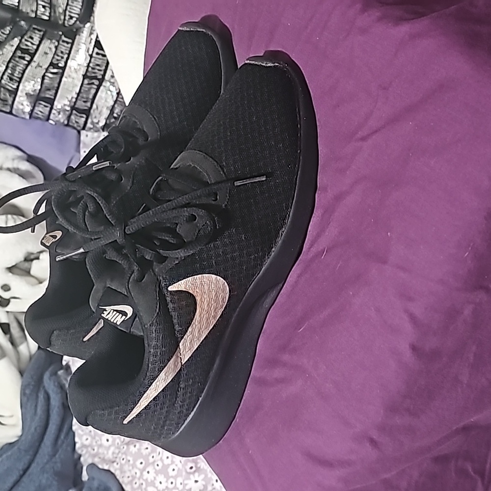 Black and rose gold nikes are in great condition and only worn a few times